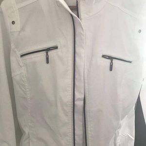 Very slimming. Super cute sporty jacket